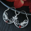 Vintage sterling silver earrings with red zirconia.