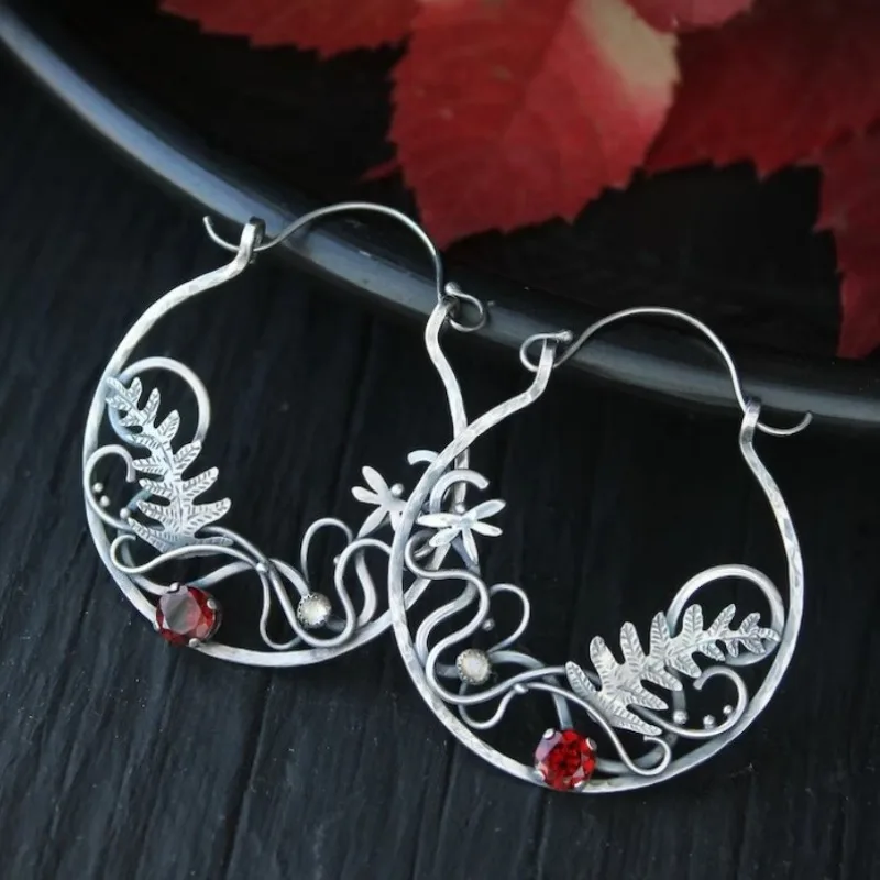 Vintage sterling silver earrings with red zirconia.