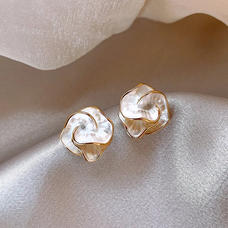 Elegant earrings crafted from white enamel