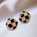 Elegant earrings crafted from lustrous black enamel
