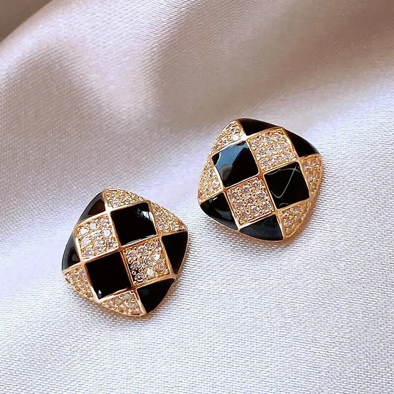 Elegant earrings crafted from lustrous black enamel