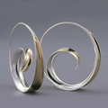 Vintage earrings with swirling waves