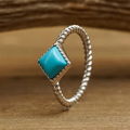 Turquoise braided band in antique silver