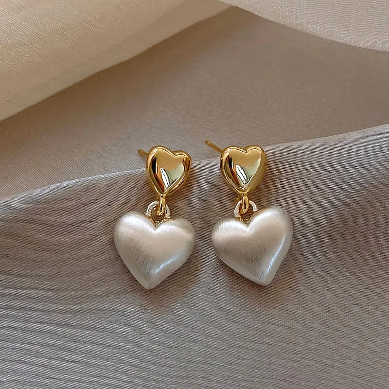 Elegant Gold Pearl Heart Studs