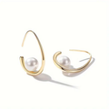 Elegant earrings crafted from pearls and gold.