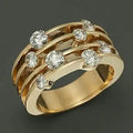 Golden layered ring with cubic zirconia stones