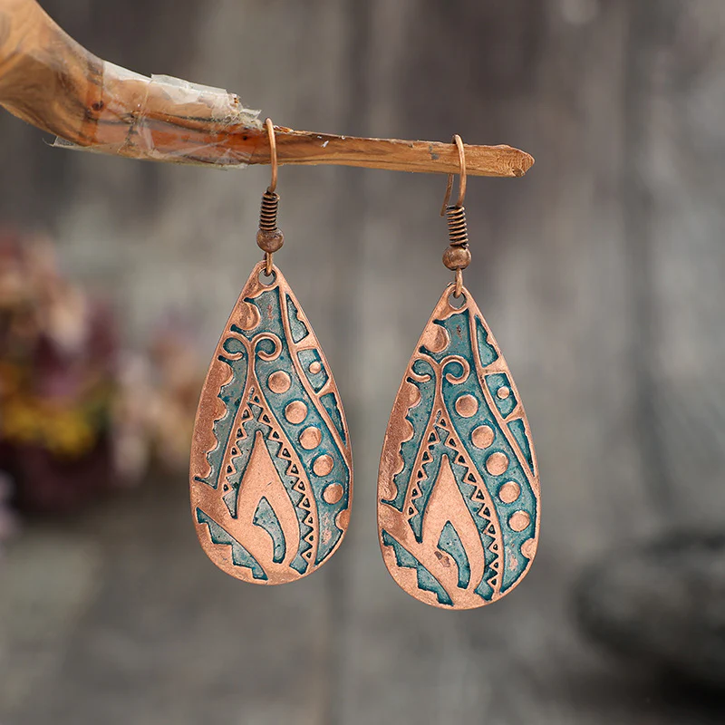 Vintage bronze drop earrings with a dangling design