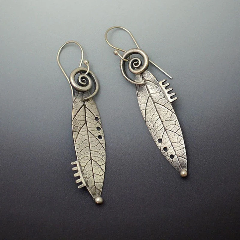 Vintage sterling silver earrings with serrated leaves