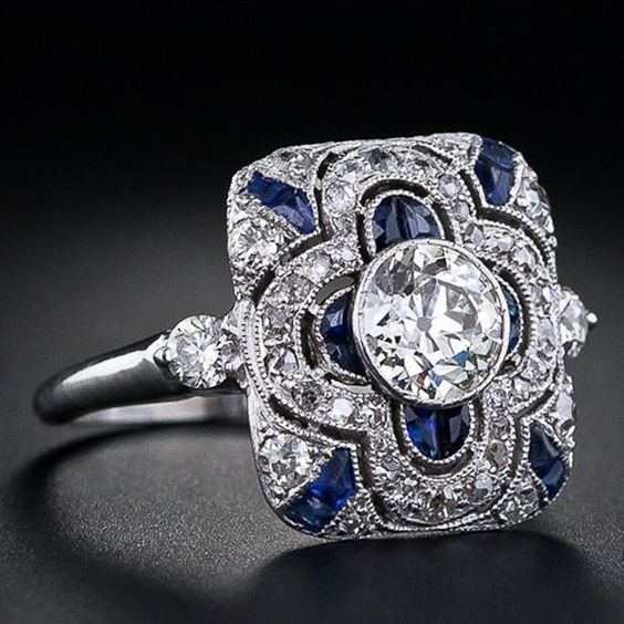 Vintage silver ring featuring a blue zirconia.