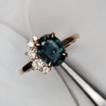 Vintage ring featuring a blue crystal and zirconia.