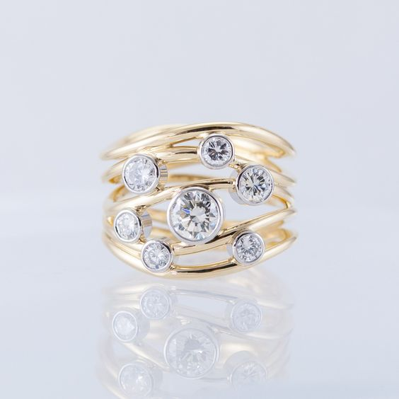Golden multi-layer ring with antique crystals