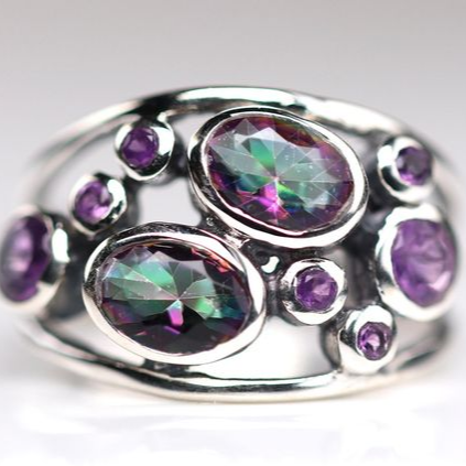 Ring with colorful crystal inlays in antique silver