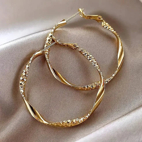 Radiant Circle Gold Earrings