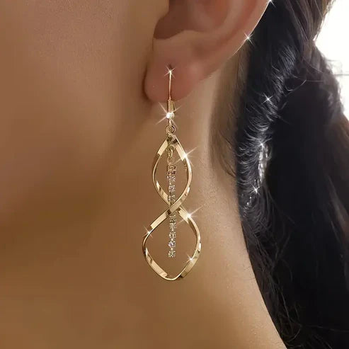 Dangling Swirl Gold Earrings