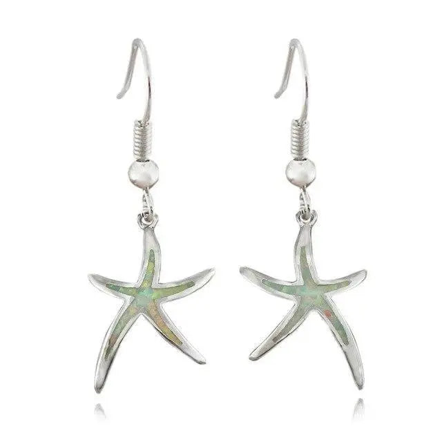 Opal and silver earrings shaped like starfish