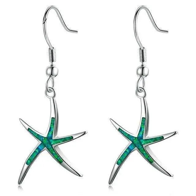 Opal and silver earrings shaped like starfish